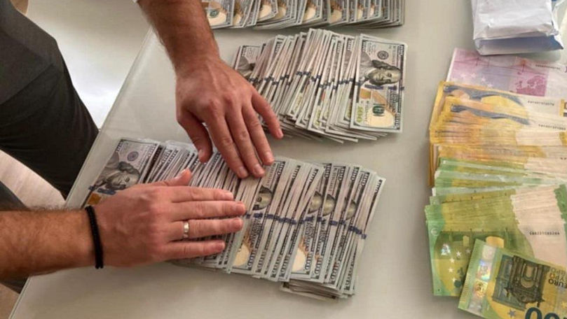 Percheziții într-un dosar de corupere electorală: 2 persoane, reținute